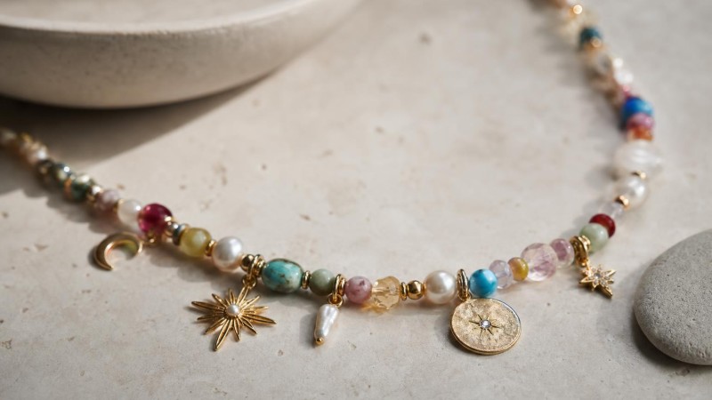 The Rise of Maximalist Beaded Charm Necklaces