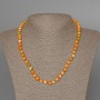Necklace of Variscite (plastic acrylic) green, orange, and white colors, smooth beads, 7mm diameter±, length 47cm±
