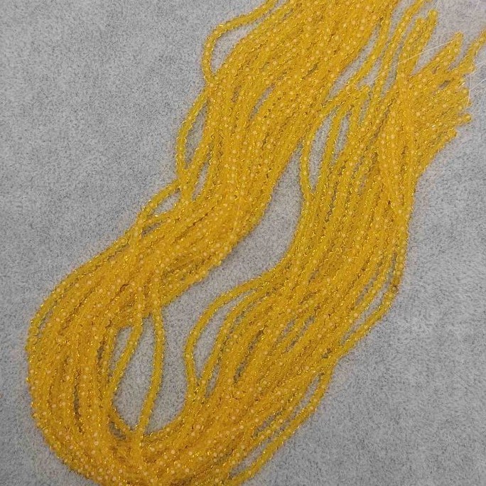 Beads Czech Crystal Yellow Transparent Briolette 3x2.5 mm, 40mm+/- length on thread