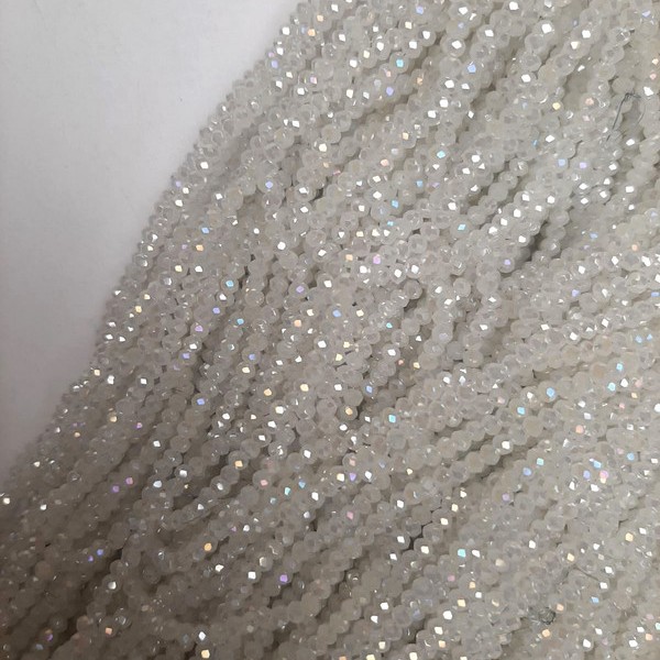 Beads Czech Crystal white with petrol tint, faceted rondelle, diameter 3×2.5mm ±, length 40cm ± on beading thread