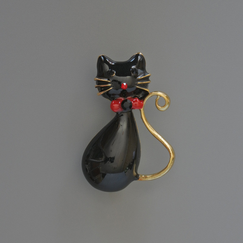 Brooch Pendant 'Cat' with black enamel, rhinestones, gold-tone metal 25x39mm