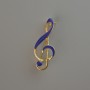 Brooch 'G clef' blue enamel, golden metal 38x16mm