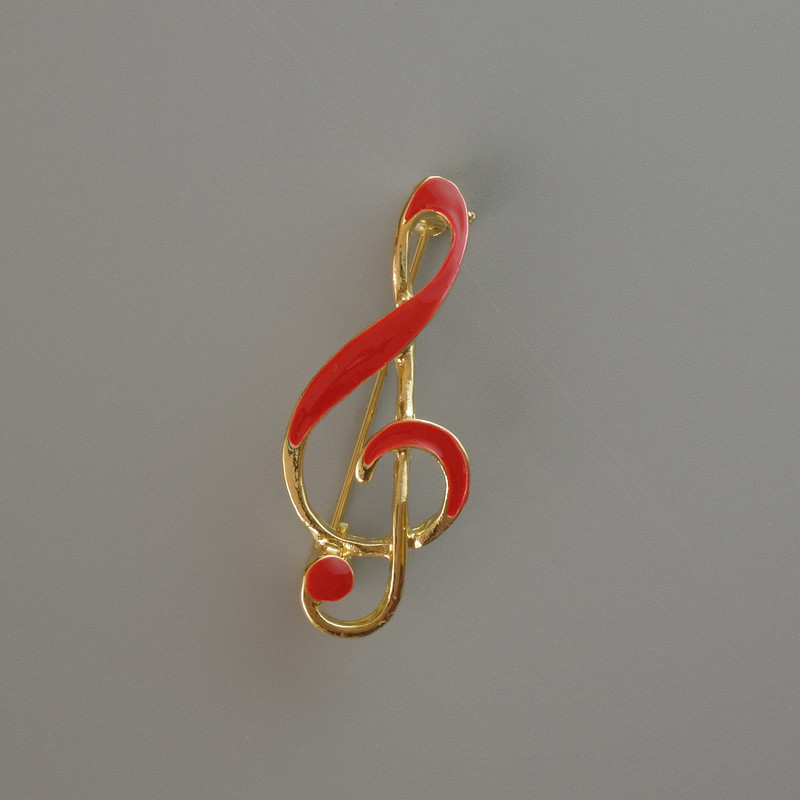Brooch - Scroll Key with red enamel, gold-tone metal 38x16mm