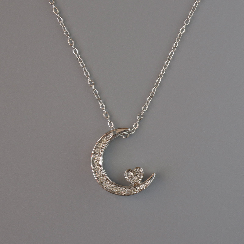 Pendant "Moon" on a chain, silvery metal, diameter 18x14mm, thickness 1mm + -, chain length 40-45cm +