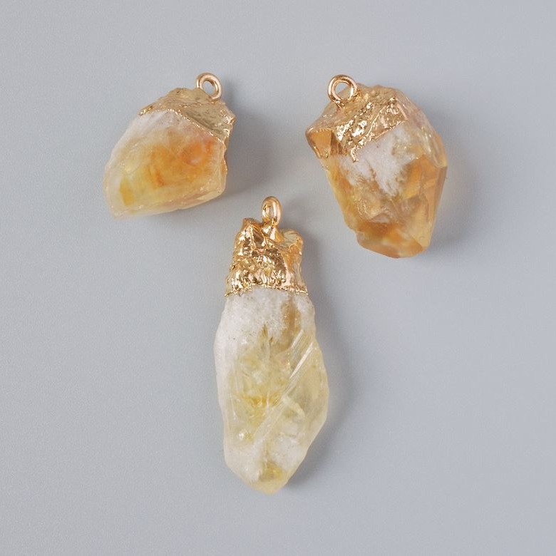Pendant Citrine natural stone unpolished from, diameter 24x15mm to 38x16mm+- assortment, golden metal