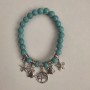 Turquoise bracelet (artificial) smooth bead, diameter 8mm ± with silvery inserts, length 18cm ± (stretch)
