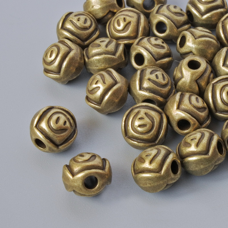Bead findings insert "Rose", diameter 7x6, 5mm, bore diameter 2mm, packaging 28 pcs ±, bronze metal color