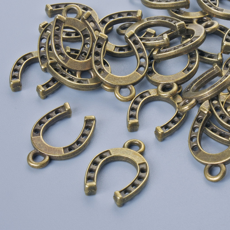 Pendant Finding "Horseshoe", diameter 15×11mm, hole diameter 1.9mm, packaging 24 pcs±, bronze metal color