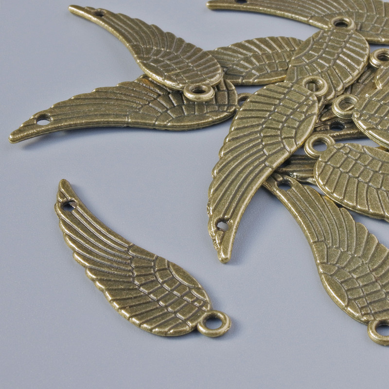 Pendant Findings "Wing", diameter 30x9mm, hole diameter 1.6mm, packaged 15 pcs ±, bronze metal color