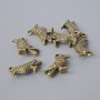 Pendant finding "Bird", diameter 18x13mm, hole diameter 1.9mm, packaged 7 pcs ±, bronze metal color