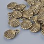Pendant Findings "Shell", diameter 13x10mm, bore diameter 1.8mm, packaged 20 pcs±, bronze metal color