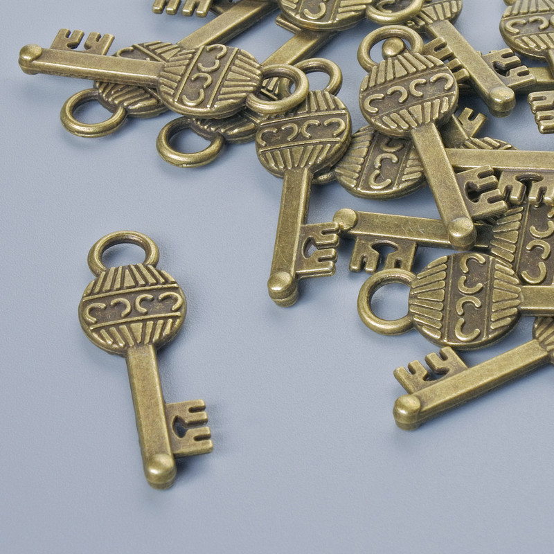 Pendant Hardware "Key", diameter 26x8mm, bore diameter 3.5mm, packaged 16 pcs±, bronze metal color