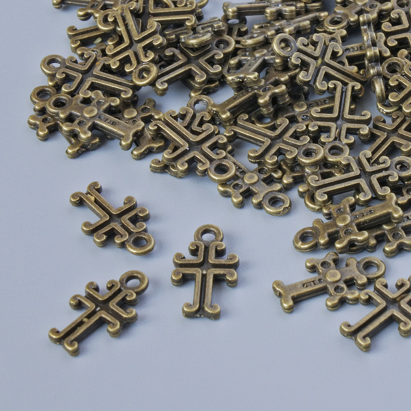Pendant hardware Cross charm, 11×6 mm, hole diameter 1.3 mm, packaged 70 pcs±, bronze metal color