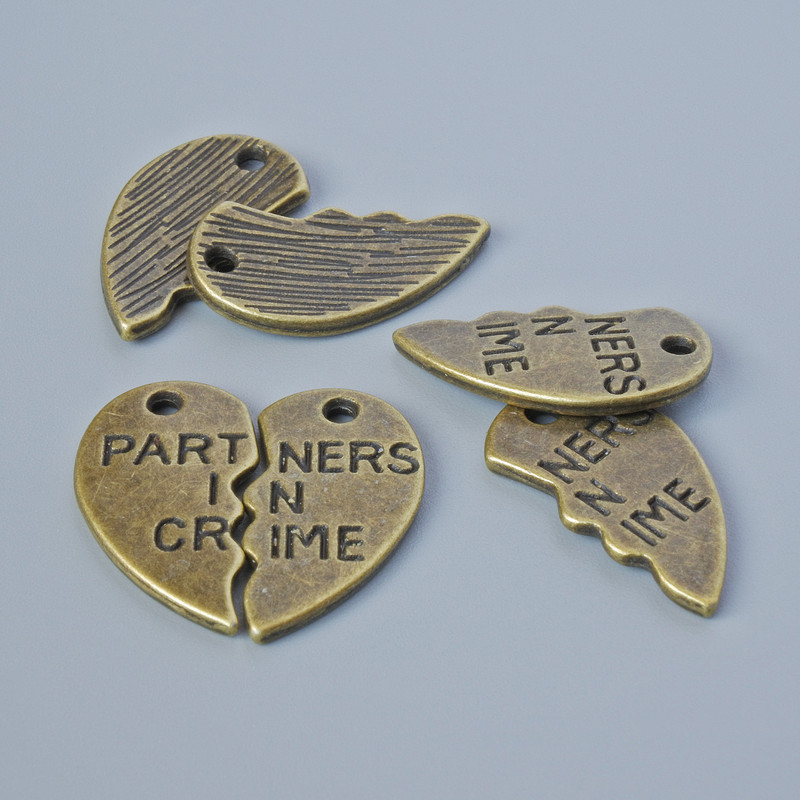 Pendant Findings "Heart" Half-Shells size, 19x10.5 mm, hole diameter 1.7 mm, packaging 3 pairs, bronze metal color
