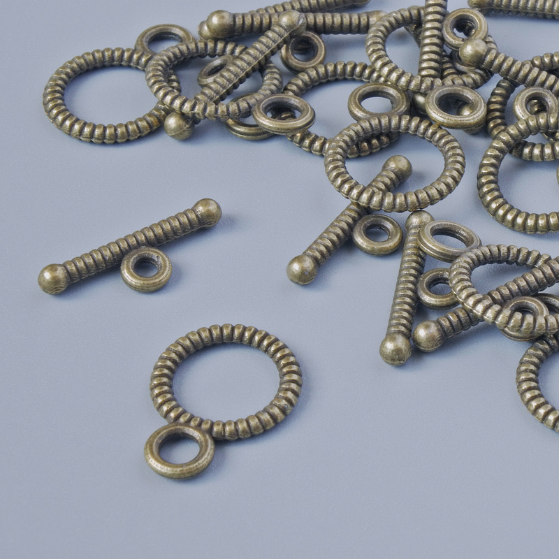 Closure hardware, diameter 10mm, 14.5mm, hole diameter 2.1.5mm packaged 14 pcs ± bronze color metal