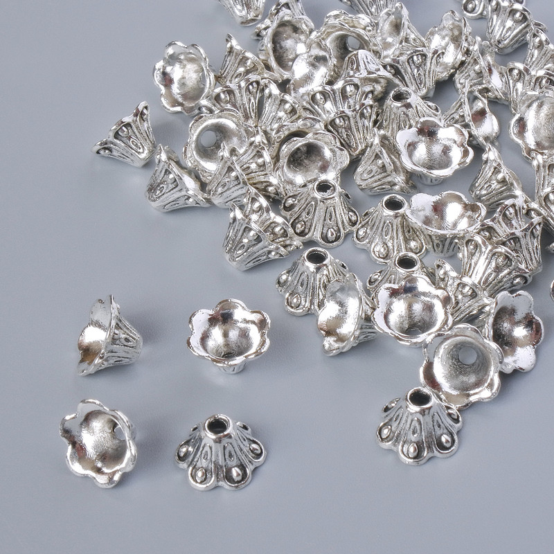 Finding tip, diameter 8x5 mm, hole diameter 1.7 mm, packaged 20 g ±, silver metal color ~57 pcs