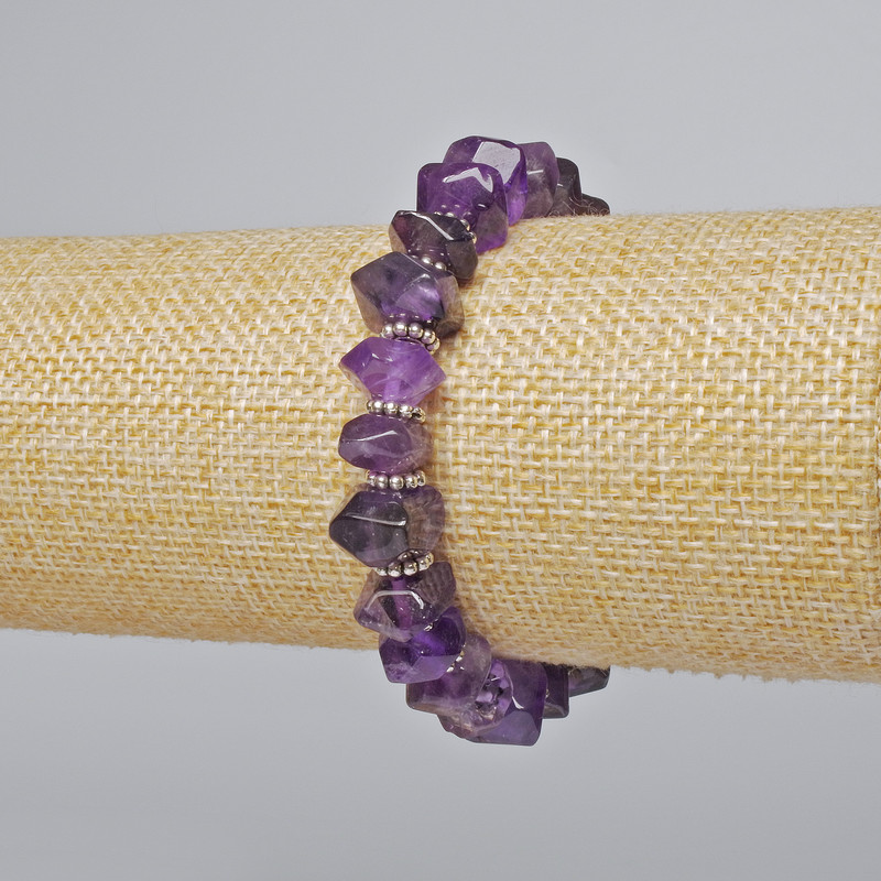 Amethyst Bracelet with natural faceted rondelle stones, diameter 10x7 mm ±, length 18 cm ± (stretch) with metal inserts