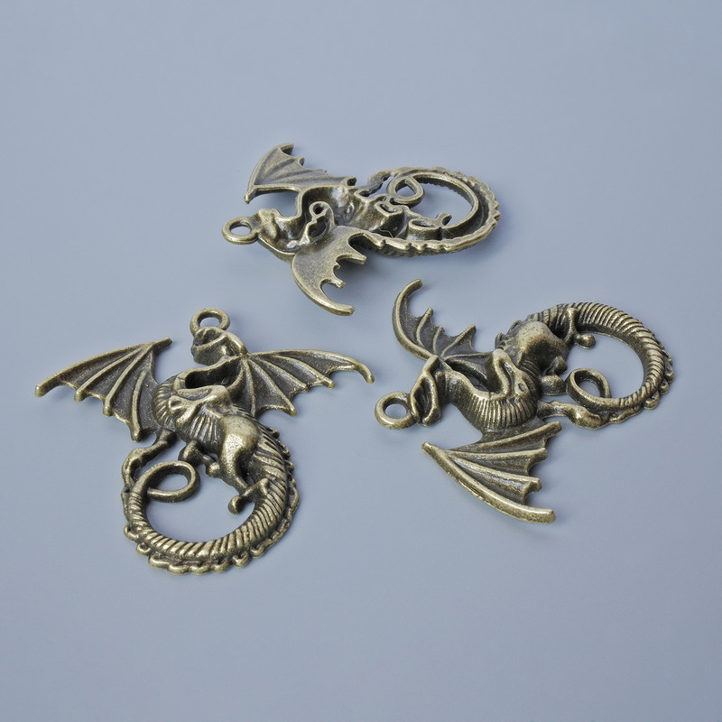 Pendant Fittings "Dragon", diameter 43x45, 5mm, hole diameter 2.8mm, packaging 1 pc., bronze metal color