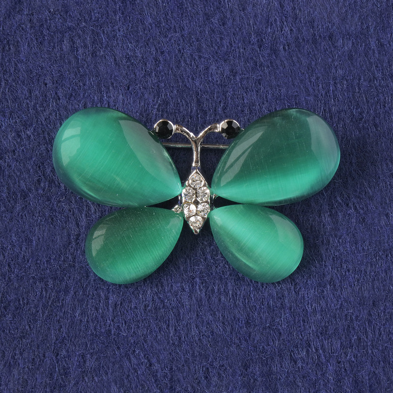 Brooch Butterfly with green cat’s eye, white crystals, silver metal 25x38mm+