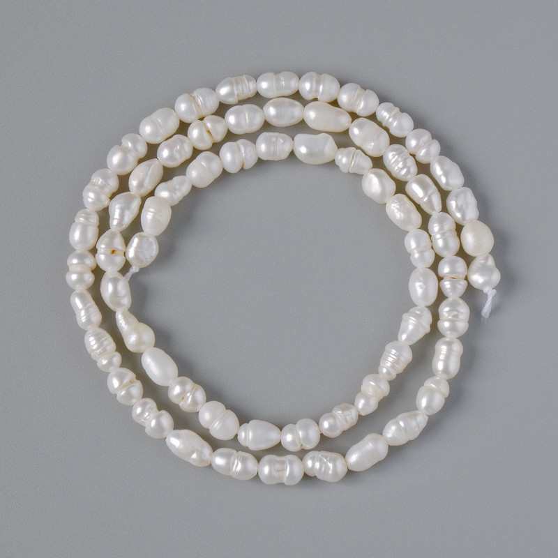 Freshwater pearls relief, diameter 3.5–5 mm, length 33 cm on a string