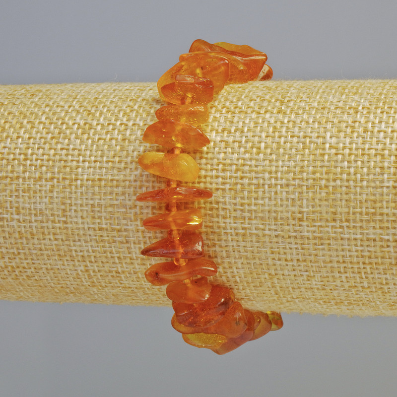 Bracelet Amber ogolite faceted, diameter 12x3mm±, (stretch) length 18cm± with beads