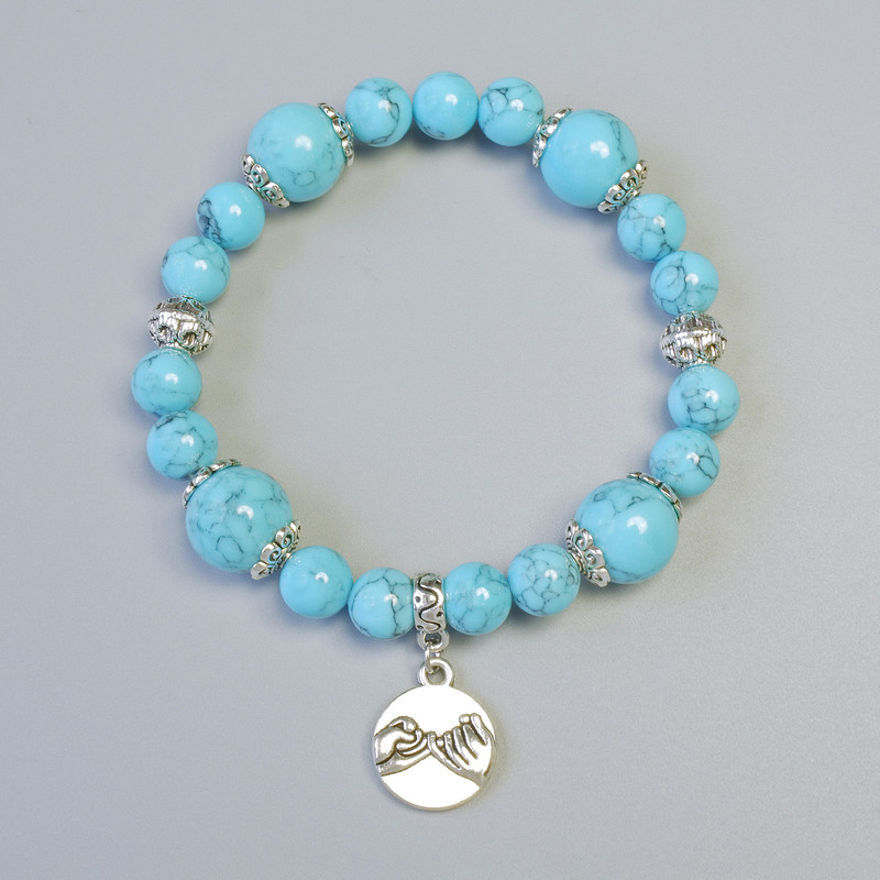 Turquoise Bracelet (Pressed) Smooth Bead, 12mm diameter, 8.5mm+- (stretch), length 18cm+- with metal accents