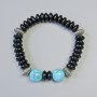 Bracelet with Black Agate and Turquoise (natural?) smooth rondelle and bead, diameter 12mm, 10x4.5mm± (stretch) length 18cm± with metal inserts
