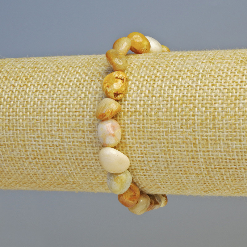 Bracelet of Fossilized Coral Natural, faceted round beads, diameter 8x10mm± (stretch), length 18cm+