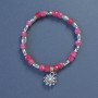 Turmaline Bead Bracelet, faceted cube, 5mm diameter ±, length 18cm ±, stretch with flower charm