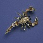 Brooch Scorpio with gold rhinestones and golden metal tone 47x25mm +