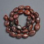 Beads made of natural stone Tiger's Eye faceted, diameter 18x12-11x10mm, +/- length 39cm