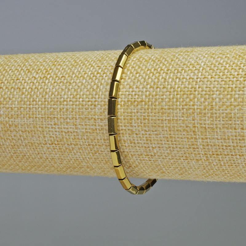 Hematite Bracelet Hexagon Rounded Corners Gold Color, diameter 5x4 mm±, length 18 cm± stretch