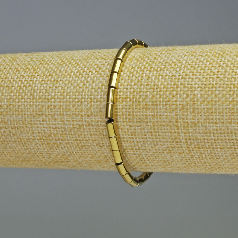 Hematite Bracelet Cylindrical Beads Gold Tone, 6x4mm, Stretch Length 18 cm