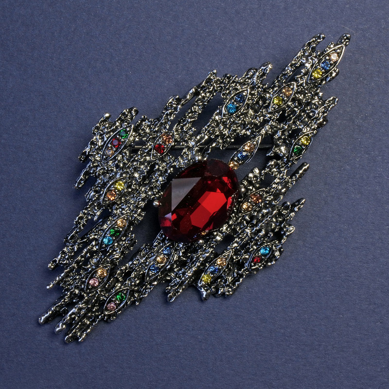 Brooch-pendant Accent with red crystal and crystals 82x44 mm +