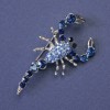 Brooch Scorpion with blue and light blue rhinestones, silver-tone metal 47x25mm +