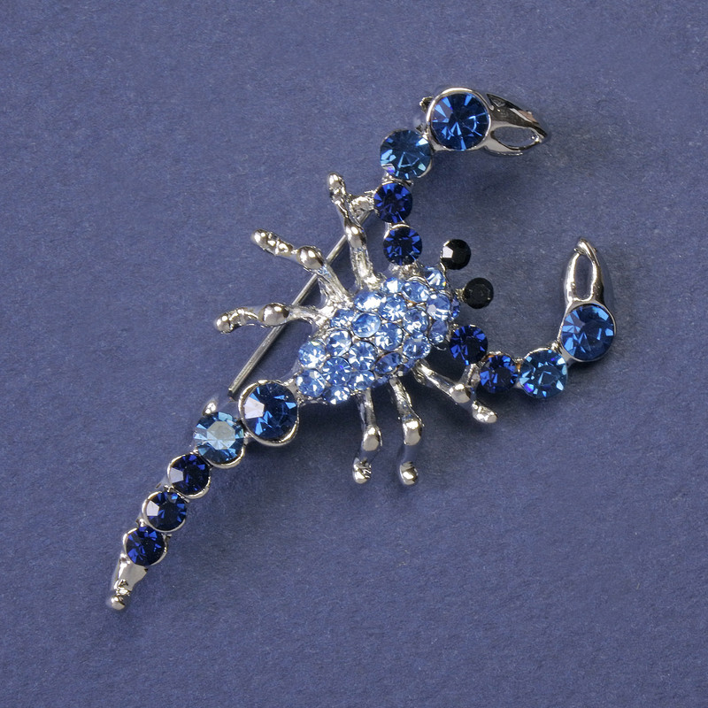 Brooch Scorpion with blue and light blue rhinestones, silver-tone metal 47x25mm +