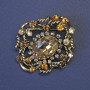Accent Brooch with Large Yellow Crystal and Rhinestones 44x38mm+- golden metal