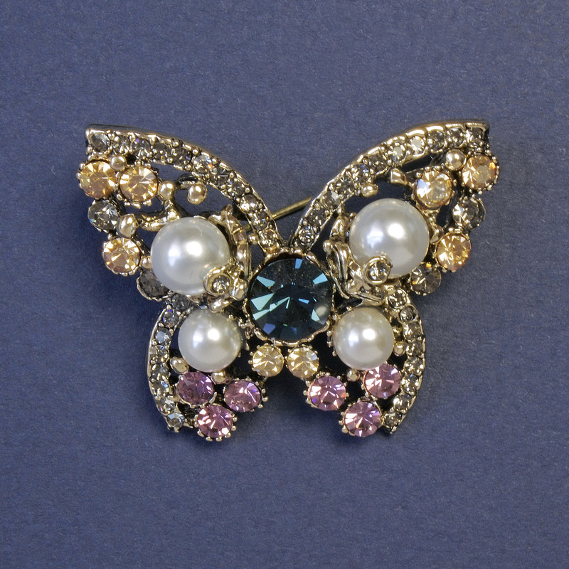 Brooch Butterfly with White Pearls and Pink, Blue, and Gray Rhinestones 32x42mm Silver Metal