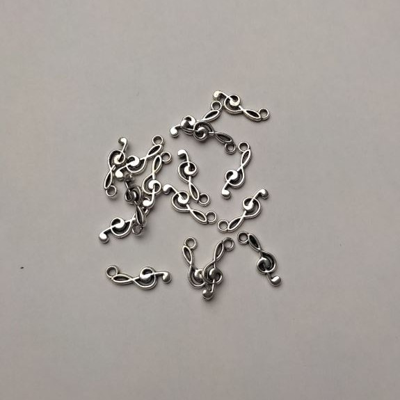 Pendant Finding Treble Clef in Silver, 19×6 mm ±, hole Ø 2 mm ±, packaging 20 g (+ -) ~39 pcs