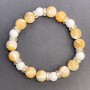 Bracelet with Mother-of-P pearl and Agate, diameter 10mm+-, and 8mm+- with filigree inserts, length 18cm+- stretch