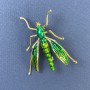 Brooch Insect, green color with golden metal, diameter 39mm±, length 42mm±