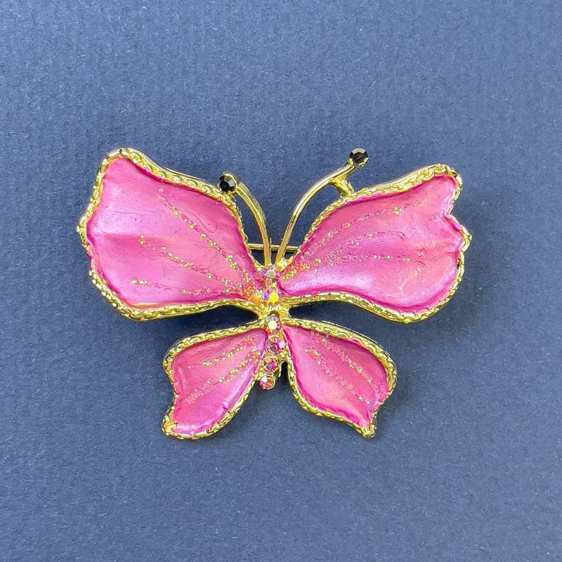 Brooch Butterfly with clear crystals pink color golden metal, diameter 44mm+-, length 33mm+-