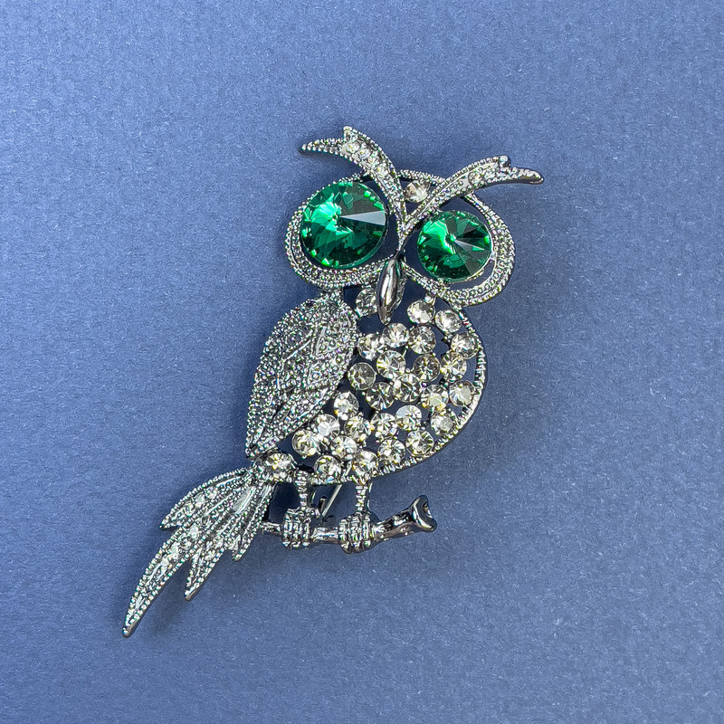 Brooch Owl with green and gray rhinestones, silver-tone metal, diameter 26mm ±, length 63mm ±