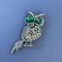 Brooch Owl with green and gray rhinestones, silver-tone metal, diameter 26mm ±, length 63mm ±