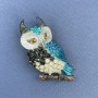 Brooch Pendant Owl with blue, black, rainbow rhinestones and enamel on silver metal, diameter 23mm+-, length 50mm+-