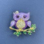 Brooch Pendant Owl with enamel and crystals on white stones, violet and green enamel, golden metal, diameter 33mm±, length 31mm±