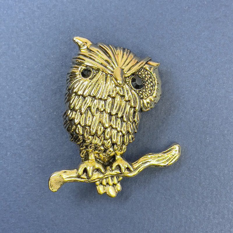 Brooch Owl with black crystals golden-tone metal, diameter 28mm+-, length 45mm+-