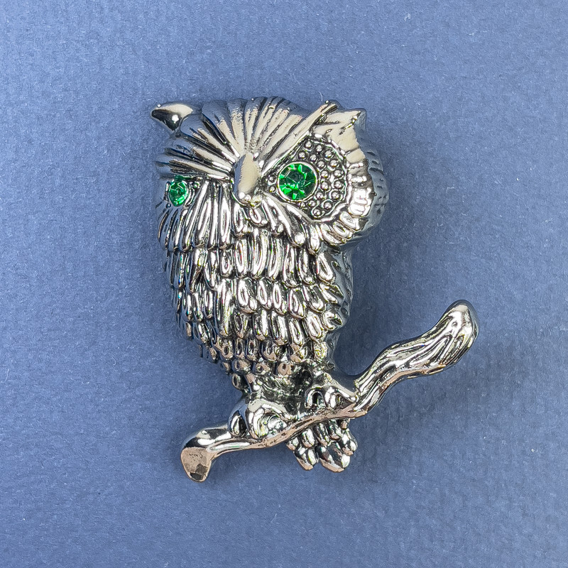 Brooch Owl with green rhinestones, silver metal, diameter 28mm±, length 45mm±