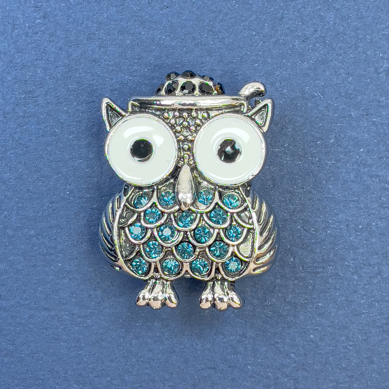 Brooch Owl with White Enamel and Light Blue Crystals, Silver Metal, diameter 22mm+-, length 29mm+-