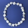 Mother-of-P pearl natural faceted beads 16x12mm± with 4mm seed beads on thread, length 39cm+